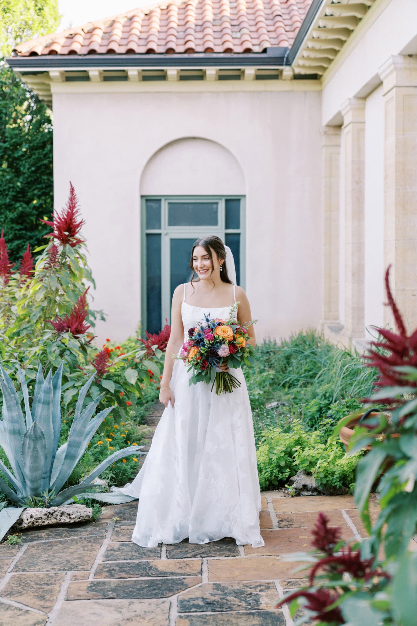 Vibrant bridal session in the gardens at The Philbrook Museum of Art in Tulsa, Oklahoma