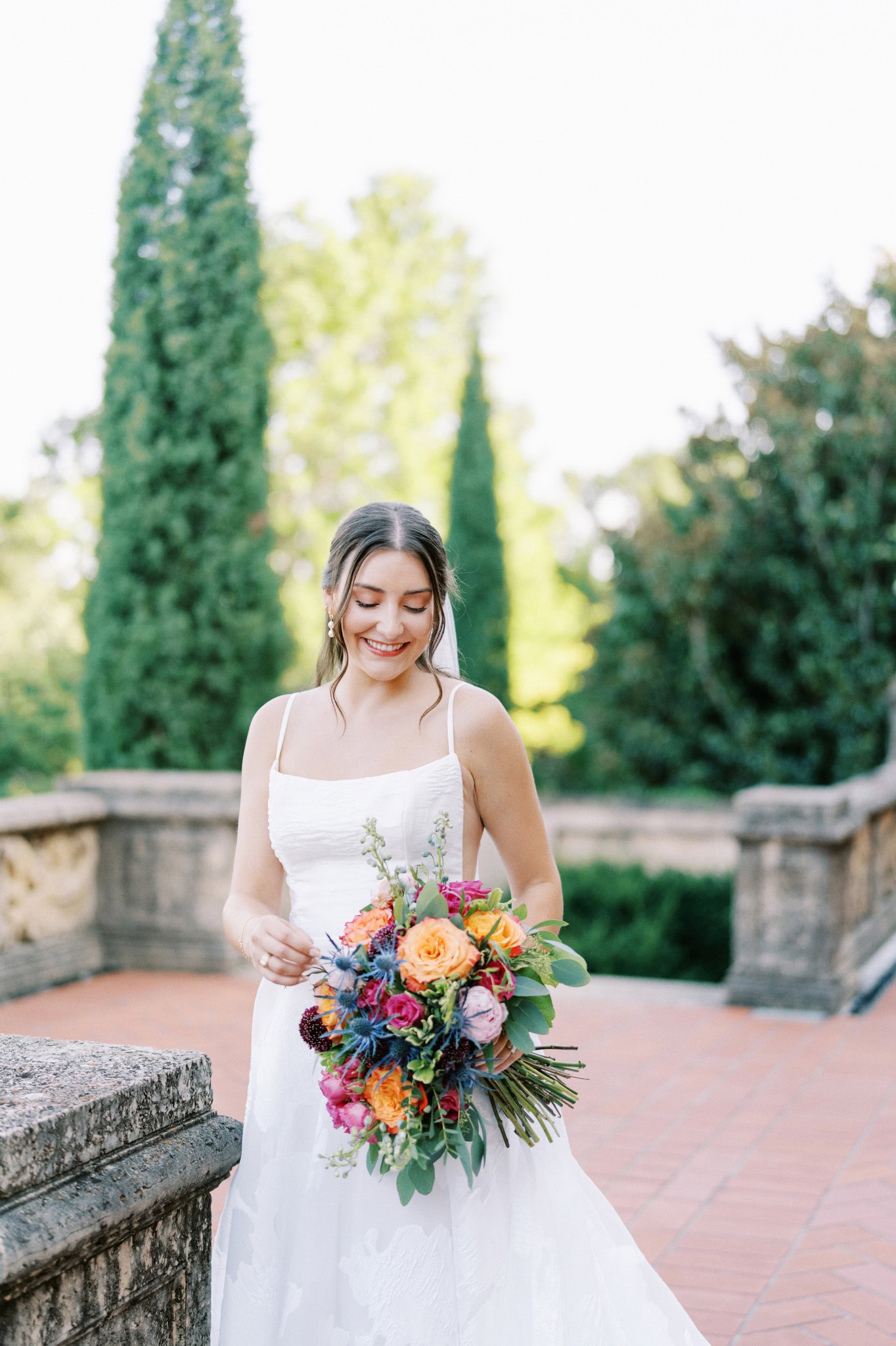 Vibrant bridal session in the gardens at The Philbrook Museum of Art in Tulsa, Oklahoma