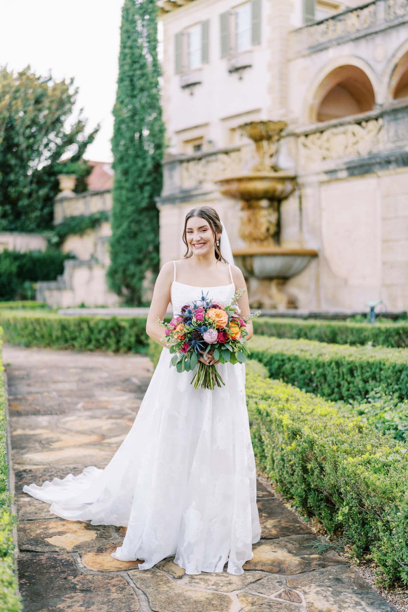 Vibrant bridal session in the gardens at The Philbrook Museum of Art in Tulsa, Oklahoma