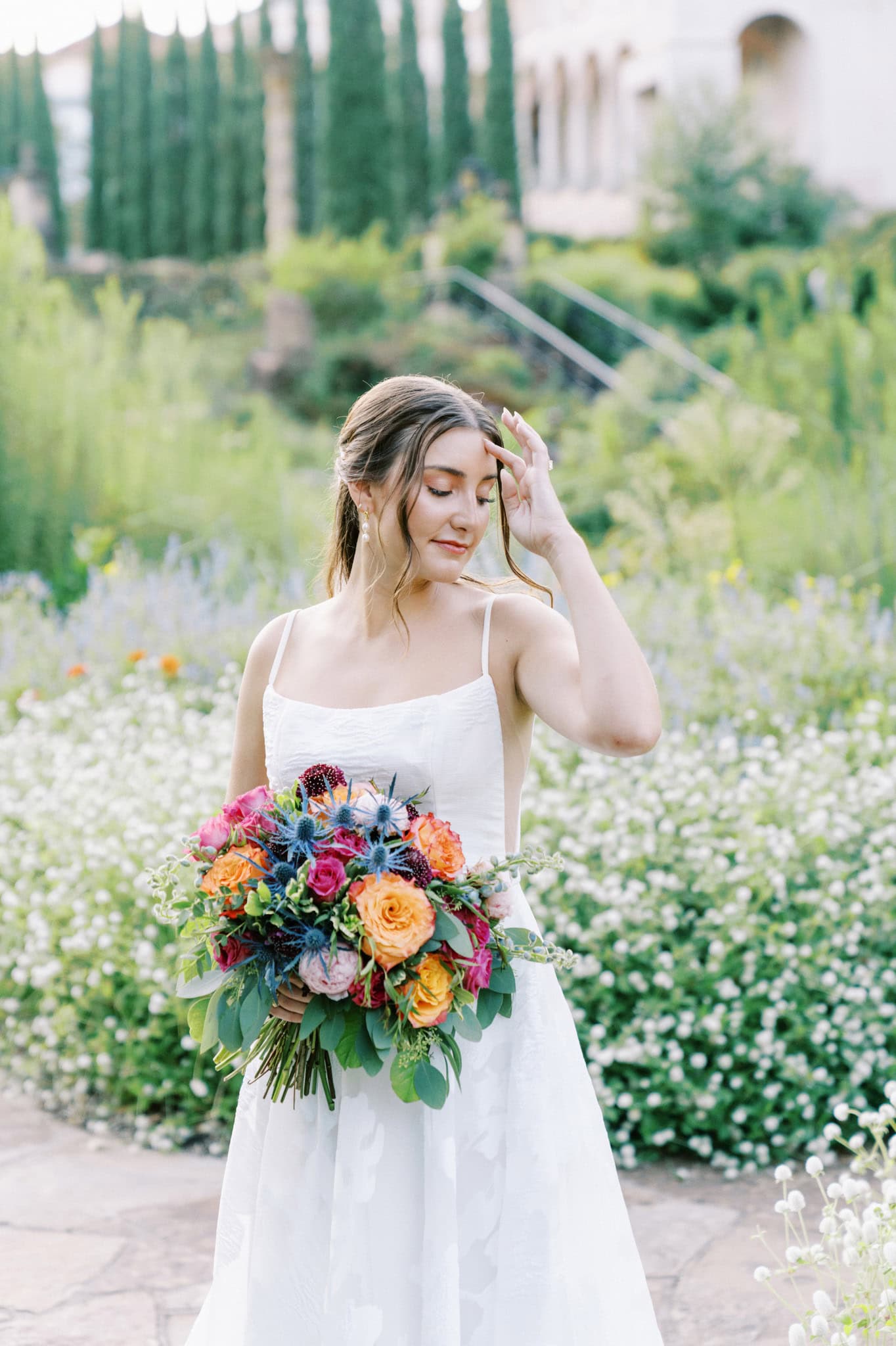 Vibrant bridal session in the gardens at The Philbrook Museum of Art in Tulsa, Oklahoma
