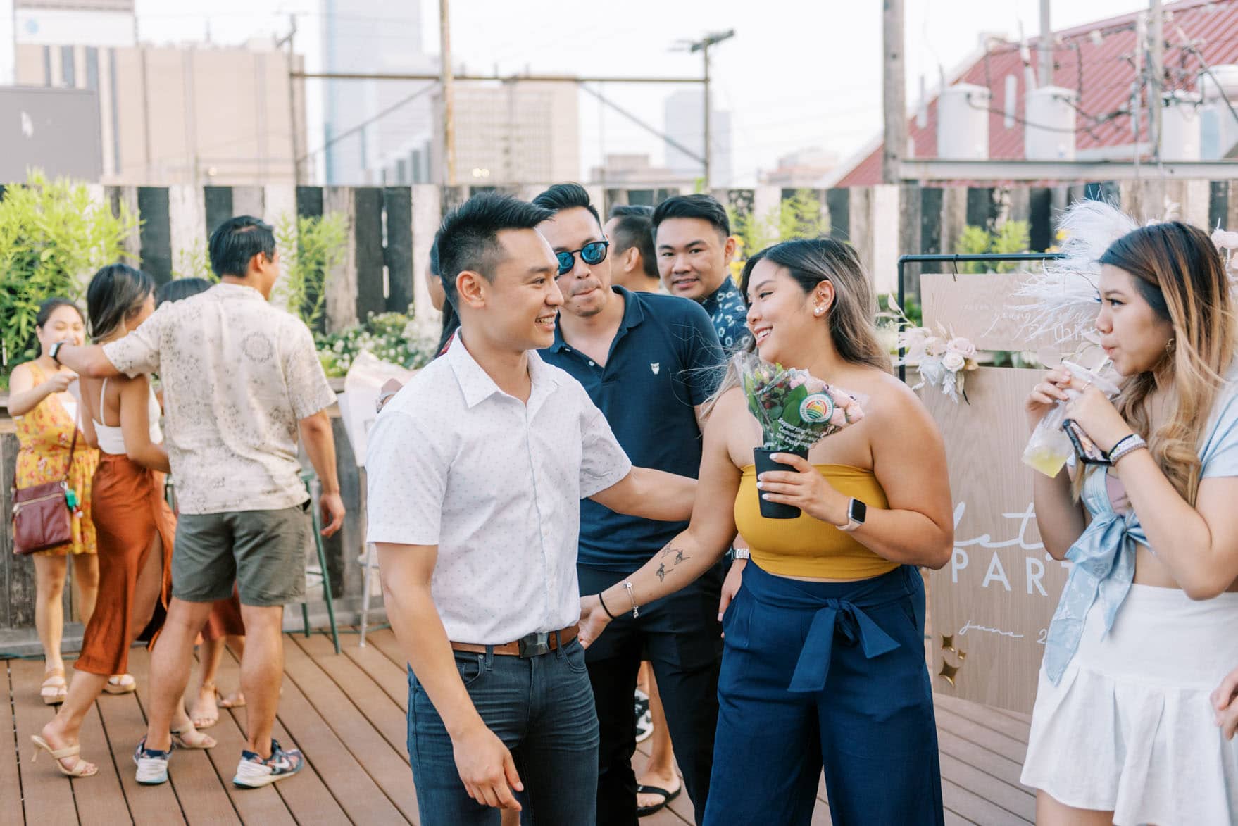 Surprise Proposal and Engagement Party on the Rooftop of Plenty Mercantile in Oklahoma City